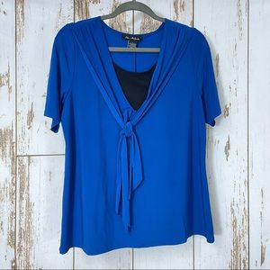 Elie McCartney, Size Large. Blue Blouse. In excellent condition!